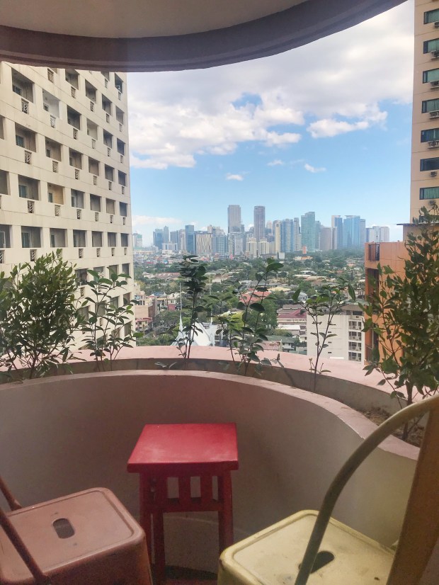Balcony with the view of Bel-Air Village greens and Ortigas Skyline