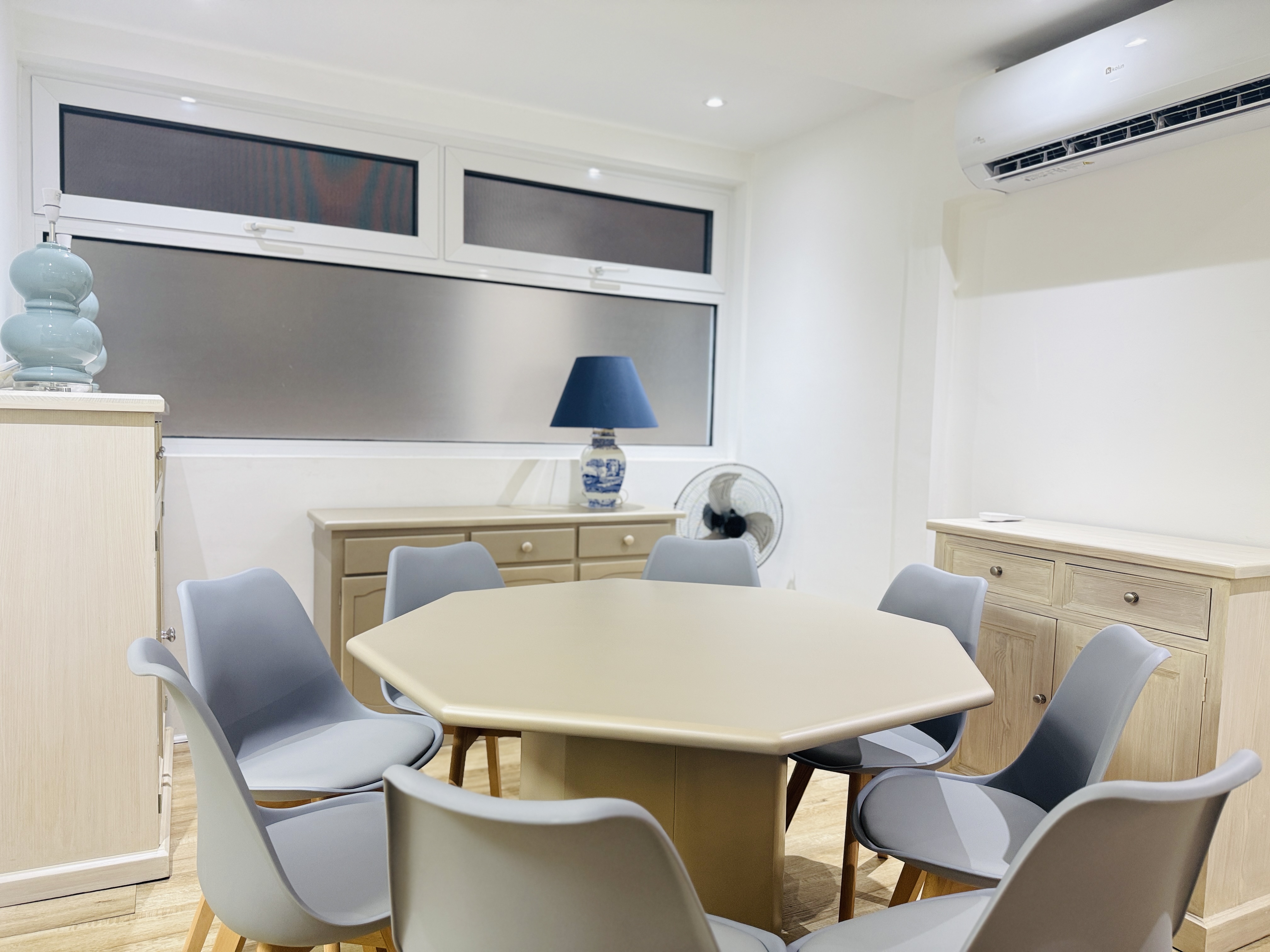 Bright dining area with new windows at the Goldland Tower 2-bedroom unit