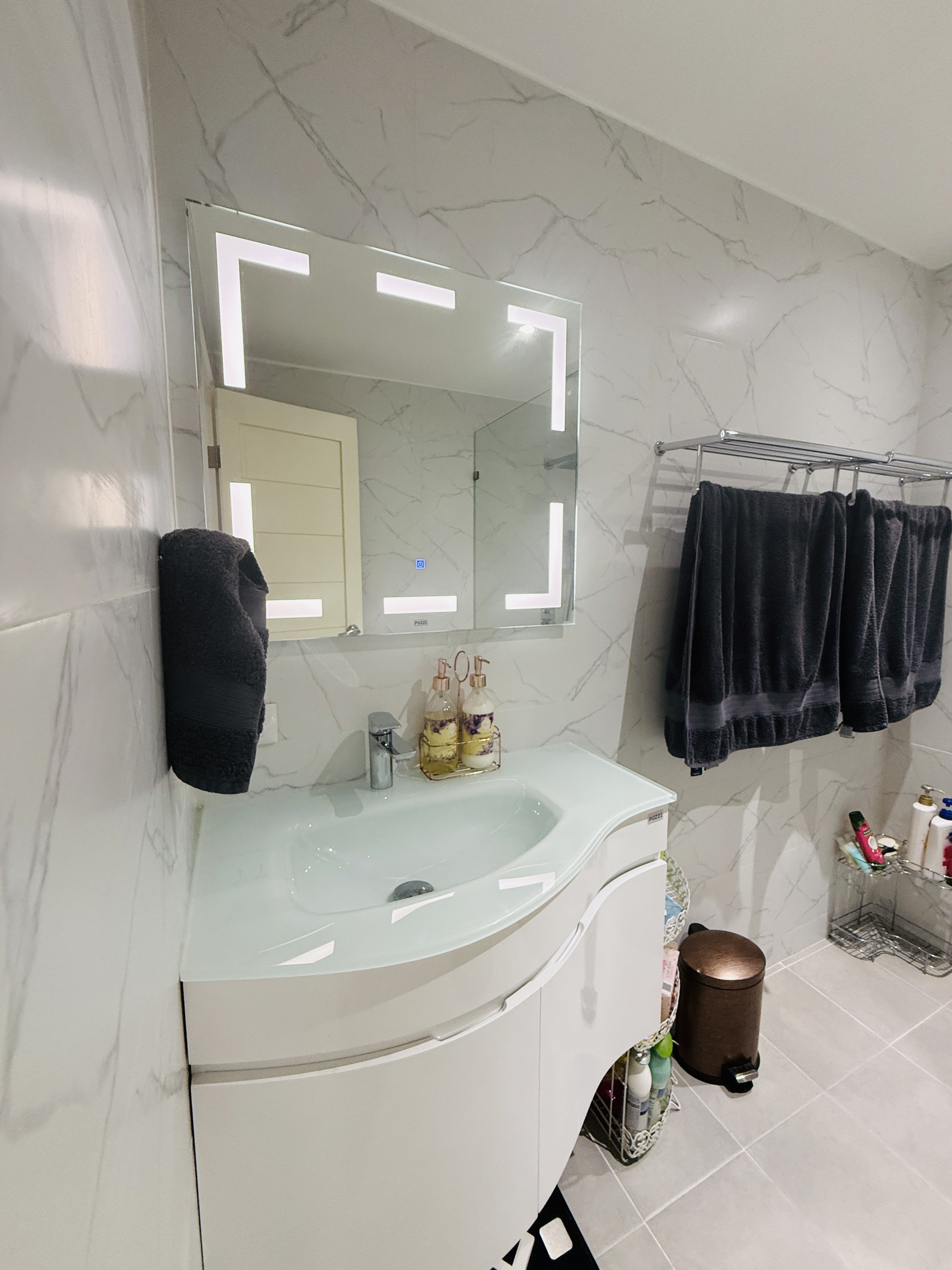 Upgraded full bathroom with new fixtures at Goldland Tower