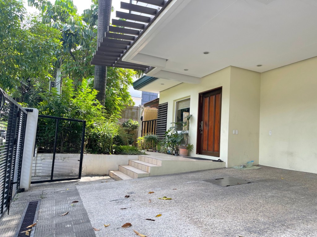 Front door entrance of a Magallanes Village house for sale, Makati