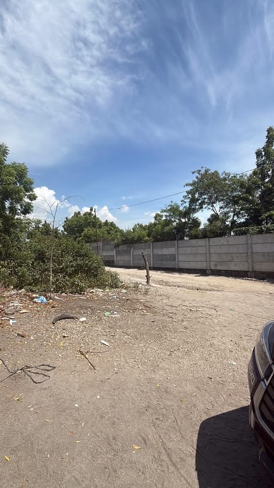 Actual photo: open inner area of the Tambler, General Santos lot with a concrete perimeter wall