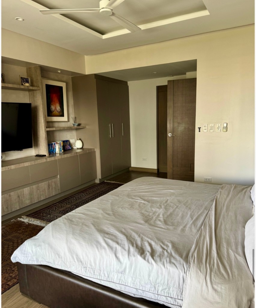Master bedroom of a 92.85 sqm 1-bedroom unit at The Mondrian Residences, Filinvest City