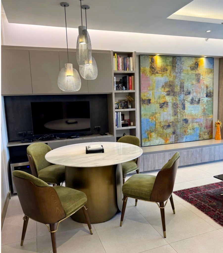 Dining area of a renovated 1-bedroom executive suite at The Mondrian Residences, Alabang