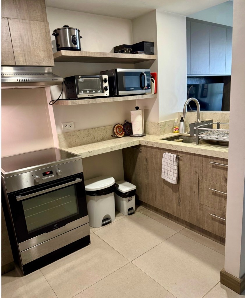 Second view of the renovated kitchen at The Mondrian Residences 1-bedroom unit, Filinvest City
